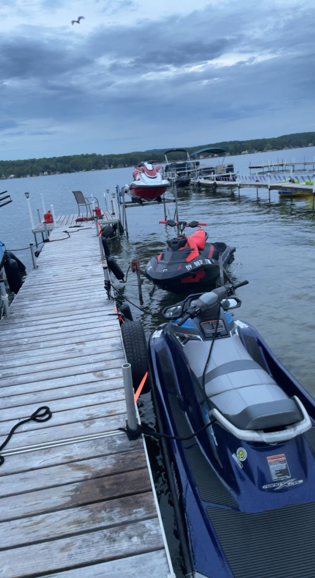 Jet skis lined up at the dock